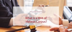 Legal professionals reading about writs of habeas corpus.