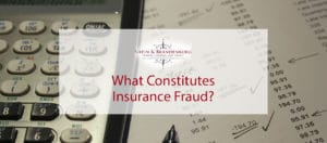 Featured image for a blog article about insurance fraud. Image features a calculator and bank statement with notes made in ink.